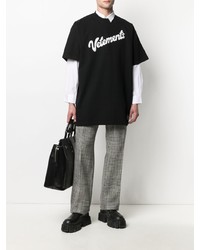 schwarzes und weißes bedrucktes T-Shirt mit einem Rundhalsausschnitt von Vetements