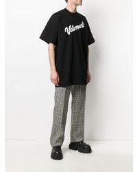 schwarzes und weißes bedrucktes T-Shirt mit einem Rundhalsausschnitt von Vetements