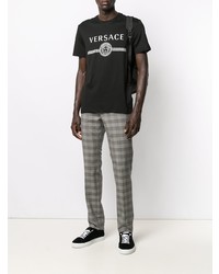 schwarzes und weißes bedrucktes T-Shirt mit einem Rundhalsausschnitt von Versace