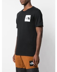 schwarzes und weißes bedrucktes T-Shirt mit einem Rundhalsausschnitt von The North Face