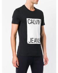 schwarzes und weißes bedrucktes T-Shirt mit einem Rundhalsausschnitt von Calvin Klein Jeans