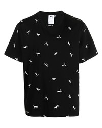 schwarzes und weißes bedrucktes T-Shirt mit einem Rundhalsausschnitt von Puma
