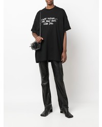 schwarzes und weißes bedrucktes T-Shirt mit einem Rundhalsausschnitt von Vetements