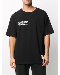 schwarzes und weißes bedrucktes T-Shirt mit einem Rundhalsausschnitt von U.P.W.W.