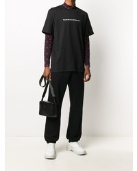 schwarzes und weißes bedrucktes T-Shirt mit einem Rundhalsausschnitt von MSGM