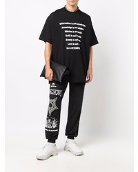 schwarzes und weißes bedrucktes T-Shirt mit einem Rundhalsausschnitt von Vetements