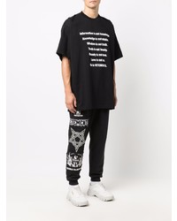 schwarzes und weißes bedrucktes T-Shirt mit einem Rundhalsausschnitt von Vetements