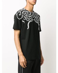 schwarzes und weißes bedrucktes T-Shirt mit einem Rundhalsausschnitt von Marcelo Burlon County of Milan