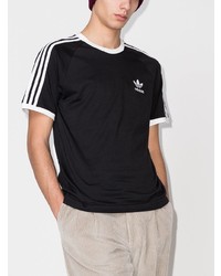 schwarzes und weißes bedrucktes T-Shirt mit einem Rundhalsausschnitt von adidas