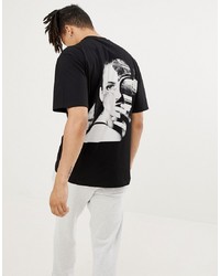 schwarzes und weißes bedrucktes T-Shirt mit einem Rundhalsausschnitt von Systvm