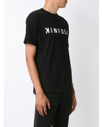 schwarzes und weißes bedrucktes T-Shirt mit einem Rundhalsausschnitt von Kinfolk