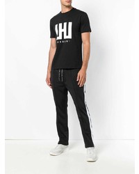 schwarzes und weißes bedrucktes T-Shirt mit einem Rundhalsausschnitt von Les Hommes Urban