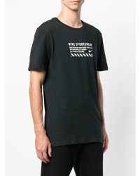 schwarzes und weißes bedrucktes T-Shirt mit einem Rundhalsausschnitt von Nike