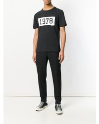 schwarzes und weißes bedrucktes T-Shirt mit einem Rundhalsausschnitt von Calvin Klein Jeans