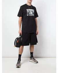 schwarzes und weißes bedrucktes T-Shirt mit einem Rundhalsausschnitt von Supreme