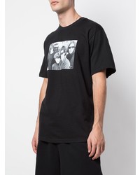 schwarzes und weißes bedrucktes T-Shirt mit einem Rundhalsausschnitt von Supreme