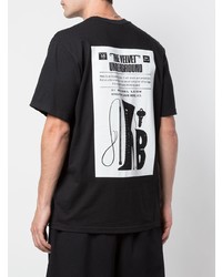 schwarzes und weißes bedrucktes T-Shirt mit einem Rundhalsausschnitt von Supreme