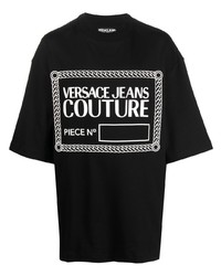 schwarzes und weißes bedrucktes T-Shirt mit einem Rundhalsausschnitt von VERSACE JEANS COUTURE