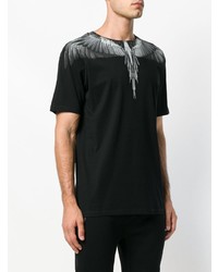 schwarzes und weißes bedrucktes T-Shirt mit einem Rundhalsausschnitt von Marcelo Burlon County of Milan