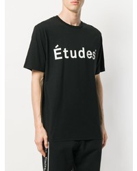 schwarzes und weißes bedrucktes T-Shirt mit einem Rundhalsausschnitt von Études