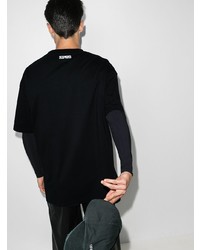 schwarzes und weißes bedrucktes T-Shirt mit einem Rundhalsausschnitt von Vetements