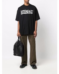 schwarzes und weißes bedrucktes T-Shirt mit einem Rundhalsausschnitt von Vetements