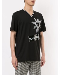 schwarzes und weißes bedrucktes T-Shirt mit einem V-Ausschnitt von Dolce & Gabbana