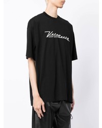 schwarzes und weißes besticktes T-Shirt mit einem Rundhalsausschnitt von Vetements