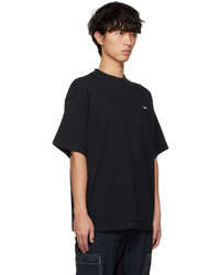 schwarzes und weißes Strick T-Shirt mit einem Rundhalsausschnitt von Nike