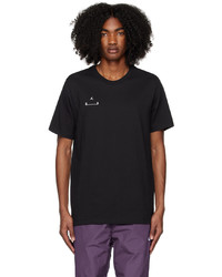 schwarzes und weißes Strick T-Shirt mit einem Rundhalsausschnitt von NIKE JORDAN
