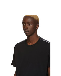 schwarzes und weißes T-Shirt mit einem Rundhalsausschnitt von Givenchy