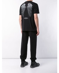 schwarzes und weißes T-Shirt mit einem Rundhalsausschnitt von Marcelo Burlon County of Milan