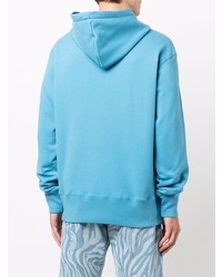 türkiser Pullover mit einem Kapuze von Moschino