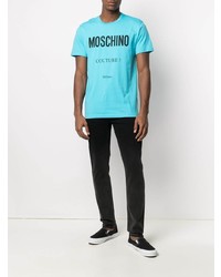 türkises bedrucktes T-Shirt mit einem Rundhalsausschnitt von Moschino