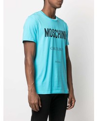 türkises bedrucktes T-Shirt mit einem Rundhalsausschnitt von Moschino