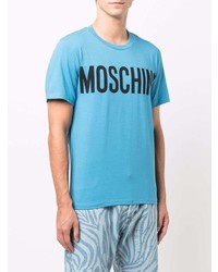 türkises bedrucktes T-Shirt mit einem Rundhalsausschnitt von Moschino