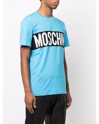 türkises bedrucktes T-Shirt mit einem Rundhalsausschnitt von Moschino