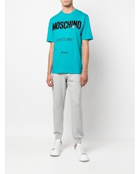 türkises bedrucktes T-Shirt mit einem Rundhalsausschnitt von Moschino