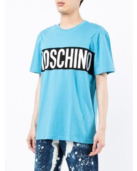 türkises bedrucktes T-Shirt mit einem Rundhalsausschnitt von Moschino