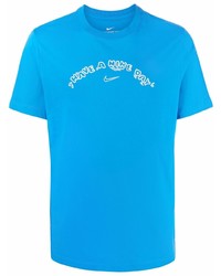 türkises bedrucktes T-Shirt mit einem Rundhalsausschnitt von Nike