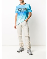 türkises bedrucktes T-Shirt mit einem Rundhalsausschnitt von Moschino