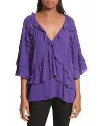 violette Bluse mit Rüschen