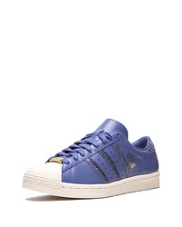 violette Leder niedrige Sneakers von adidas