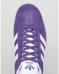 violette Turnschuhe von adidas