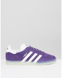 violette Turnschuhe von adidas