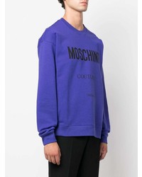 violettes bedrucktes Fleece-Sweatshirt von Moschino