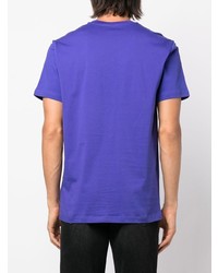 violettes bedrucktes T-Shirt mit einem Rundhalsausschnitt von Moschino