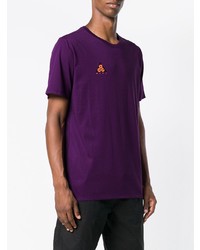 violettes bedrucktes T-Shirt mit einem Rundhalsausschnitt von Nike