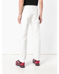 weiße bedruckte enge Jeans von Raf Simons