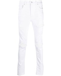 weiße enge Jeans mit Destroyed-Effekten von Amiri